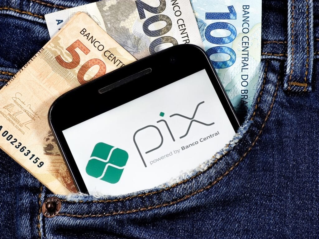 Tela de celular mostrando forma de pagamento digital com parcelamento